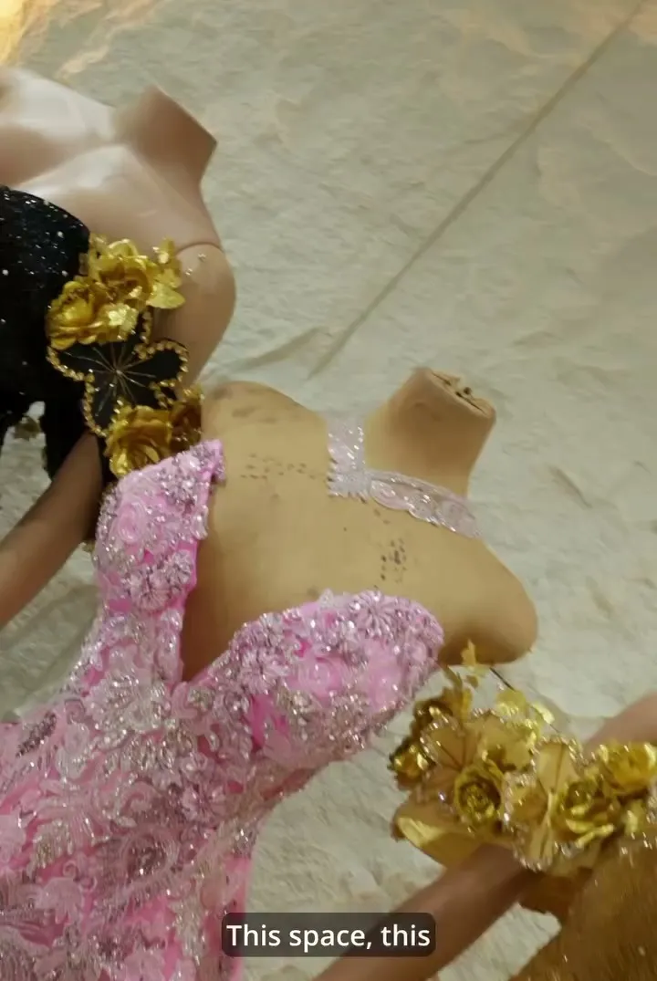 A pink beaded bodice on a mannequin