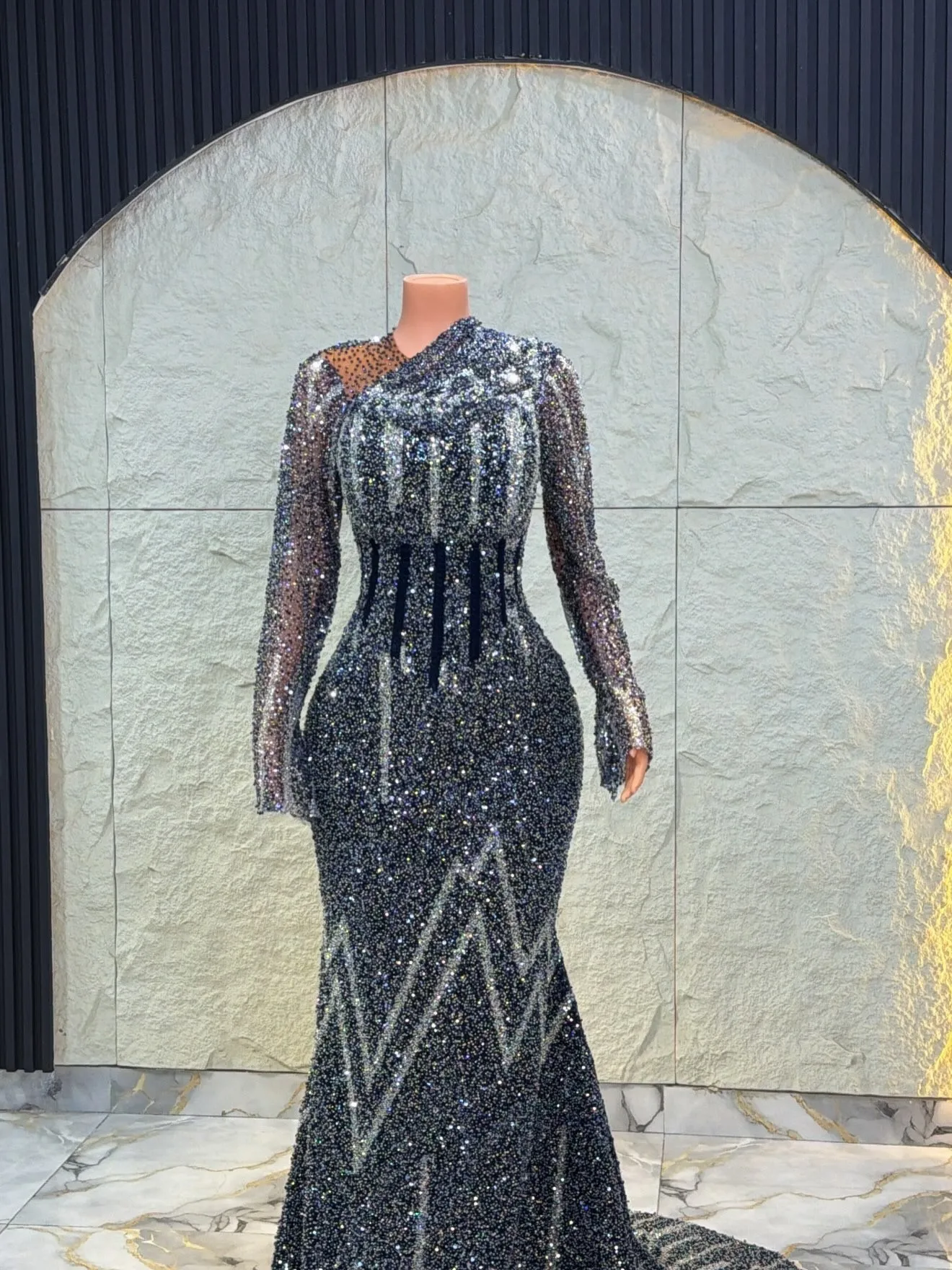 The beaded bodice and sleeves up close